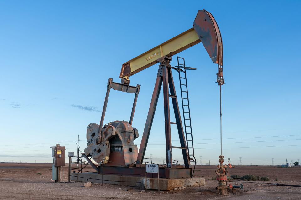 An oil rig and pump in Stanton, Texas.