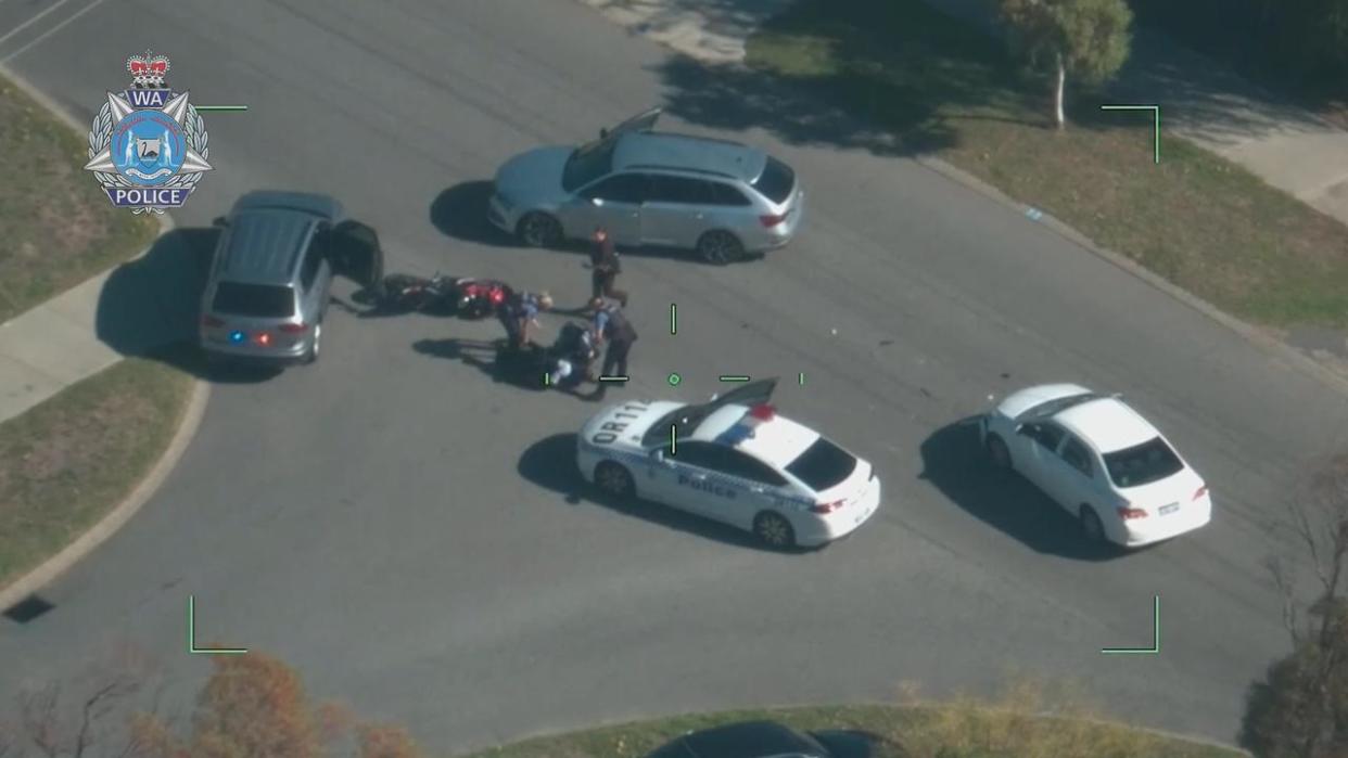 still from wa police video of motorbike crash and arrest