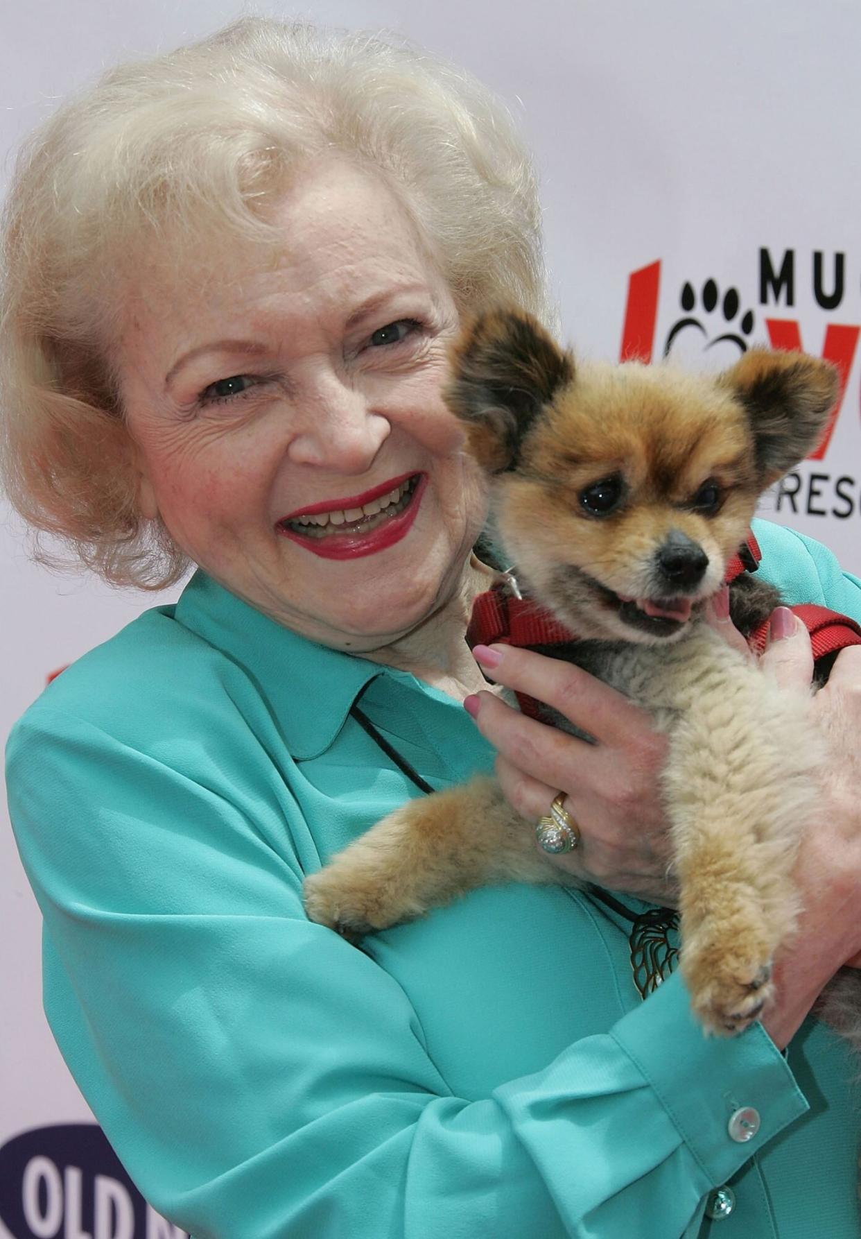 Betty White Holding Puppy