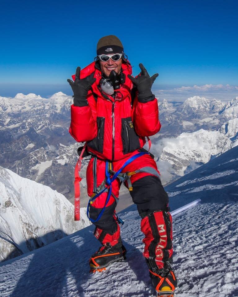 Elia Saikaly smiles and celebrates reaching the peak of Mount Everest. Source: Facebook