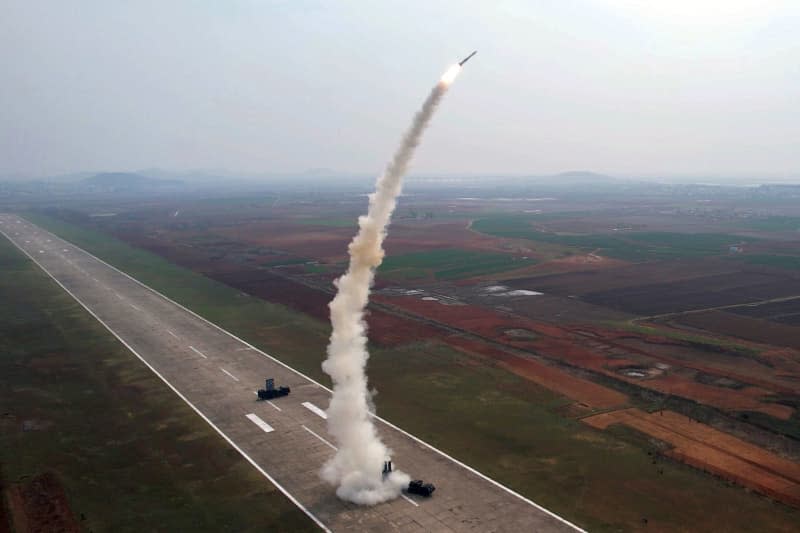A picture released by the North Korean State News Agency (KCNA) on 20 April 2024 shows a "super-large warhead" power test for a strategic cruise missile and a test-fire of a new anti-aircraft rocket near the Yellow Sea. -/YNA/dpa
