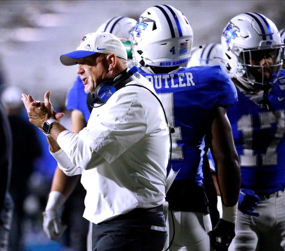 Middle Tennessee head football coach Rick Stockstill pumps up his players as they come off the field between plays during the football game against Louisiana Tech in Floyd Stadium at Middle Tennessee, in Murfreesboro, Tenn. on Tuesday, Oct. 10, 2023.