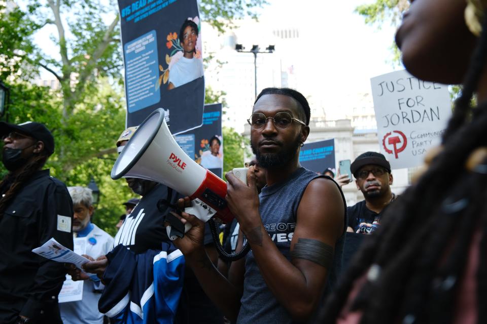People attend a vigil at City Hall Park for Jordan Neely, who was fatally choked on a subway by a fellow passenger ten days ago, on May 11, 2023 in New York City.