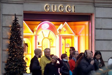 A Gucci sign is seen outside a shop in Paris, France, December 18, 2017. REUTERS/Charles Platiau/Files
