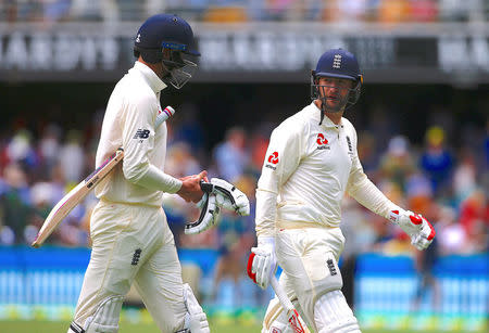 Cricket - Ashes test match - Australia v England - GABBA Ground, Brisbane, Australia, November 23, 2017. England's Mark Stoneman talks with fellow batsman James Vince as they walk off the ground at lunch during the first day of the first Ashes cricket test match. REUTERS/David Gray