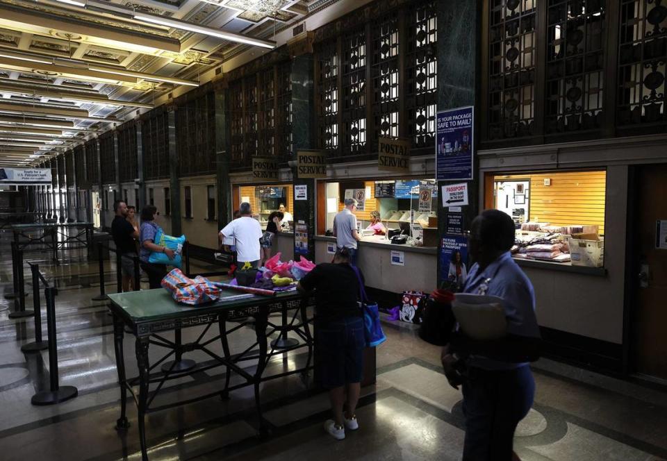 Community members visit the post office in downtown Fort Worth on Friday, Aug. 16, 2024.