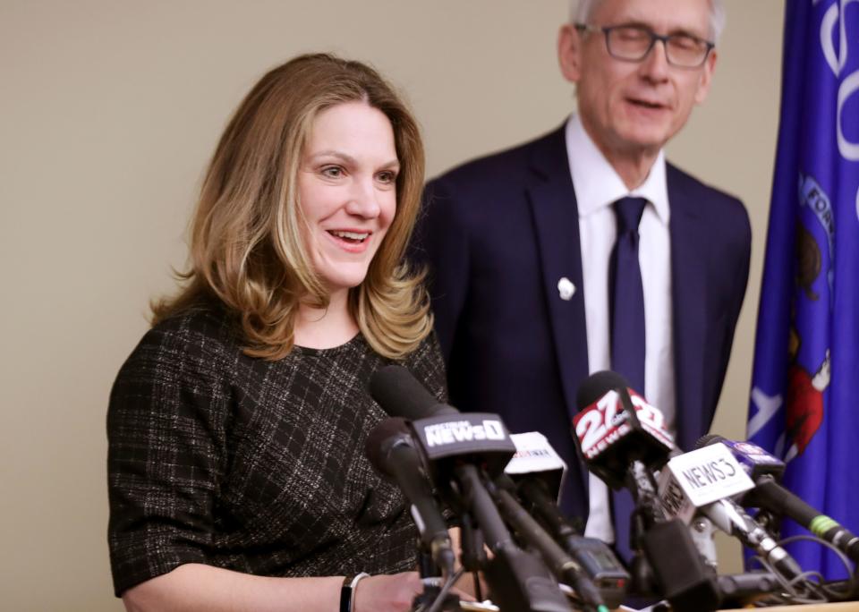 Andrea Palm, who was appointed to head the Wisconsin Department of Health Services but never confirmed to the position, speaks during a news conference in Madison in 2019 alongside then-Gov.-elect Tony Evers.