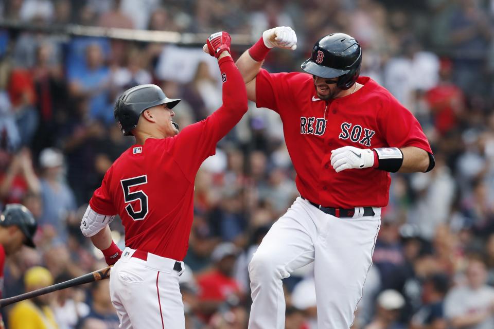 Boston Red Sox's Kevin Plawecki celebrates his solo home run with Enrique Hernandez (5) during the third inning of a baseball game, Saturday against the New York Yankees, Sept. 25, 2021, in Boston. (AP Photo/Michael Dwyer)
