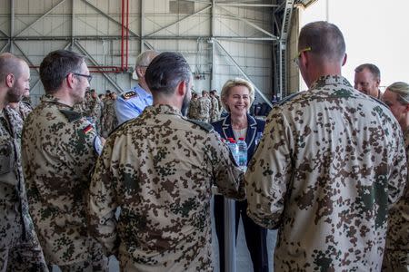 German Defence Minister Ursula von der Leyen talks to Counter DAESH contingent members at Incirlik airbase in the southern city of Adana, Turkey, July 1, 2016. Bundeswehr/PAO DEU EinsKtgt Counter DAESH, Jirka Ohk/Handout via REUTERS