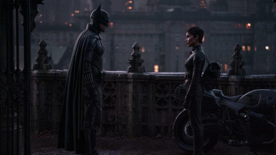 Catwoman Selina Kye and Batman facing off in Matt Reeves' The Batman 2022. Robert Pattinson's Batman may be a little less emo with friends by his side.