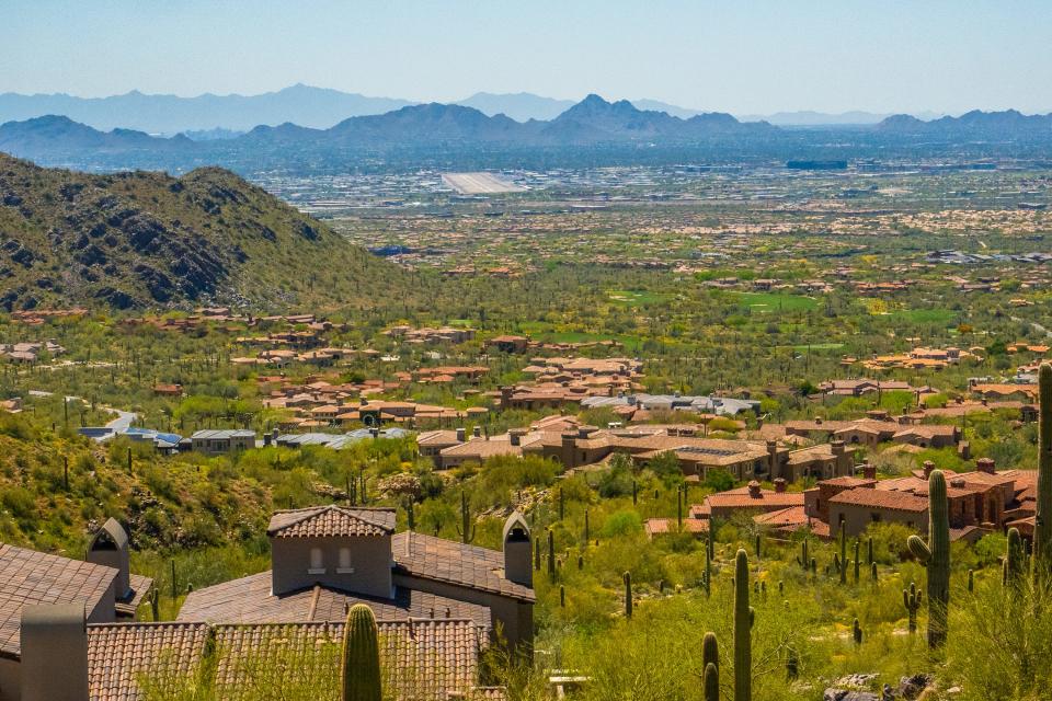 Mega mansions in the desert in Scottsdale with mountains in the background