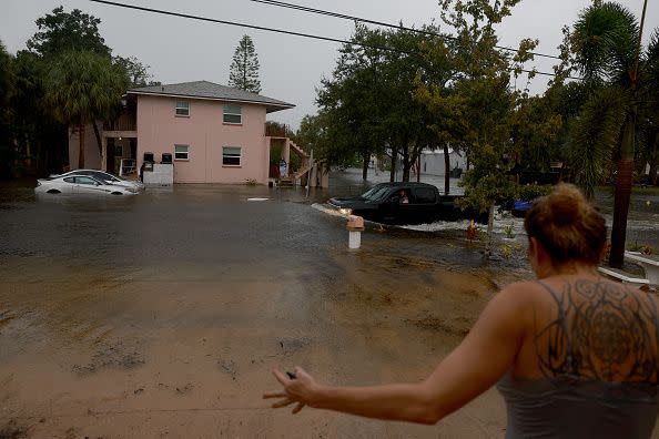 TARPON SPRINGS, FLORIDA - AUGUST 30: A truck passes through flooded streets caused by Hurricane Idalia passing offshore on August 30, 2023 in Tarpon Springs, Florida. Hurricane Idalia is hitting the Big Bend area of Florida. (Photo by Joe Raedle/Getty Images)