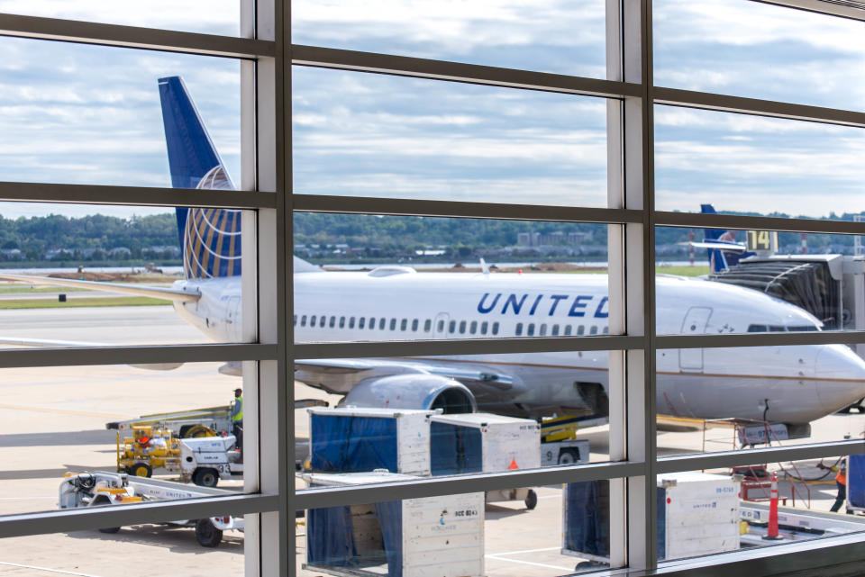 Washington, DC, United States - October 4, 2014: DCA, Reagan National Airport, Washington, DC - View out airport window to airplanes and ramp operations