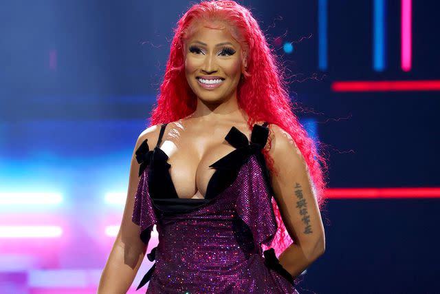 <p>Kevin Mazur/WireImage</p> Nicki Minaj performs in New York City in March 2024