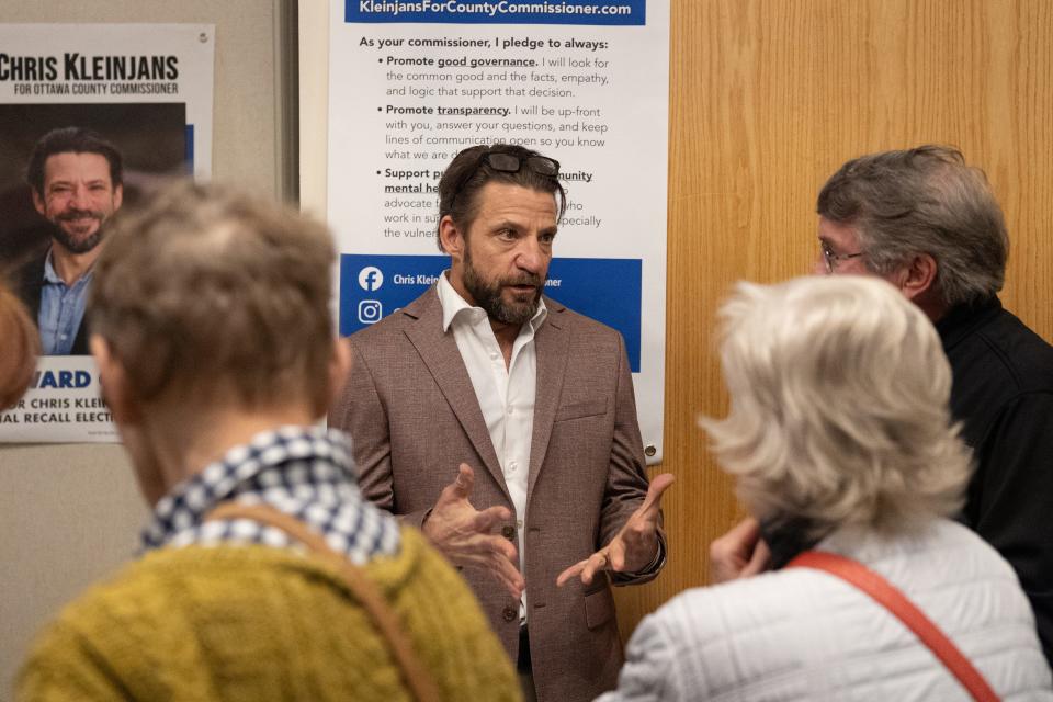 Chris Kleinjans, a Democrat and District 2 candidate, speaks to guests during a meet-and-greet on Thursday, April 18.