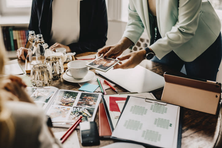 An event planner working at their desk