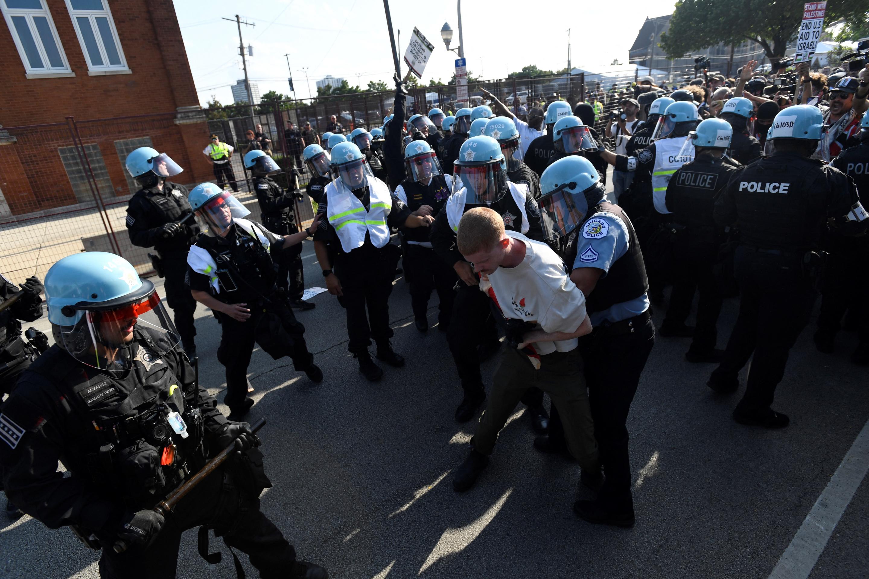 Police arrest a pro-Palestinian activist during a demonstration outside the Democratic National Convention in Chicago. (Mathew Hatcher/AFP via Getty Images)