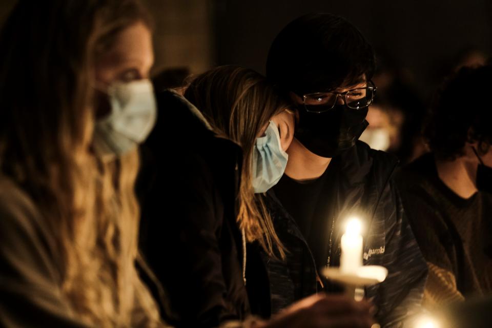 Students, parents, teachers, and community members gather for a vigil at the Lake Point Community Church following the shooting at Oxford High School on November 30, 2021 in Oxford, Michigan.