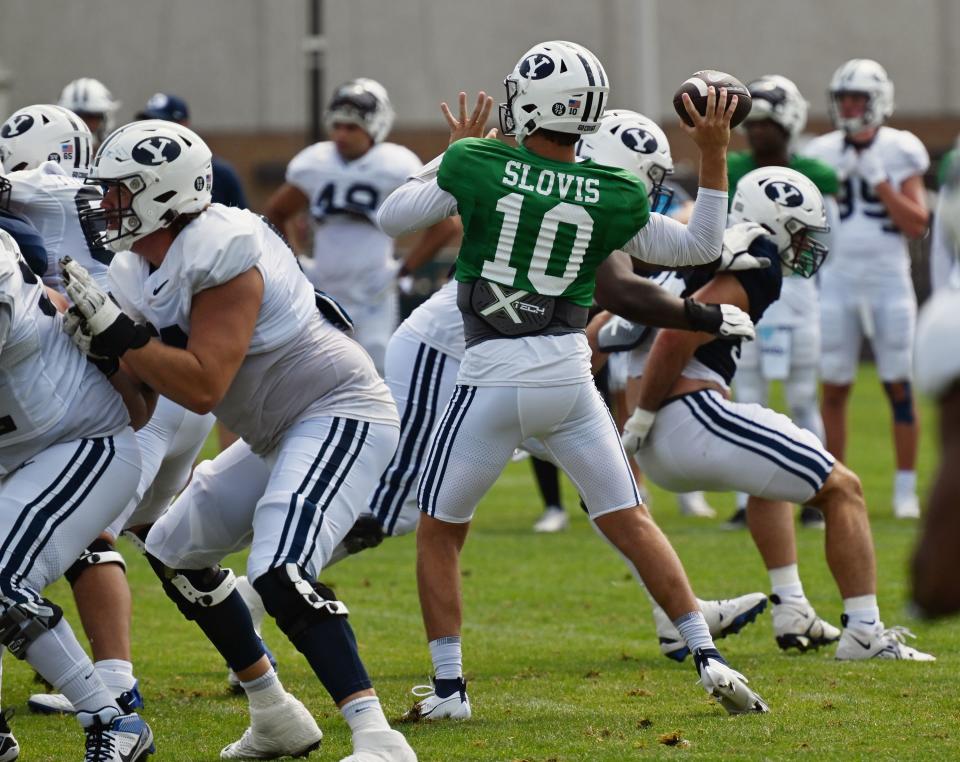 BYU’s Kedon Slovis throws the football during practice in Provo on Tuesday, Aug. 8, 2023.