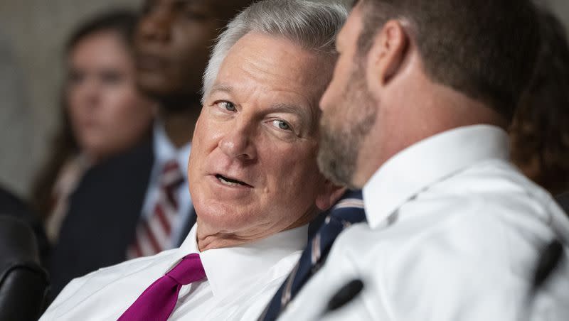 Sen. Tommy Tuberville, R-Ala., left, speaks with Sen. Markwayne Mullin, R-Okla., during a Senate Armed Services Committee nominations hearing of Gen. David Allvin for reappointment to be U.S. Air Force Chief of Staff, on Sept. 12, 2023, on Capitol Hill in Washington.