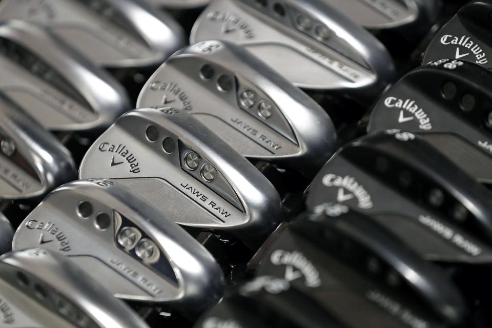 A selection of Callaway wedges hang on display at Golf Galaxy in Montrose.