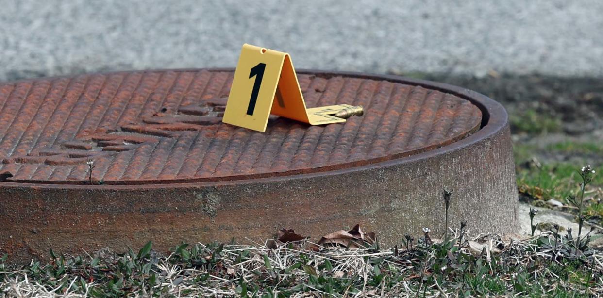 A shell casing is marked as evidence as Massachusetts State Police investigate a fatal shooting at 36 Hoover Ave. in Brockton on Easter Sunday, March 31, 2024.