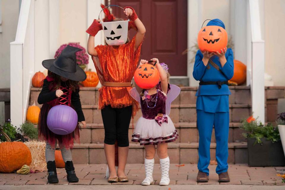 <p>Getty/Image Source</p> Children photographed while trick or treating