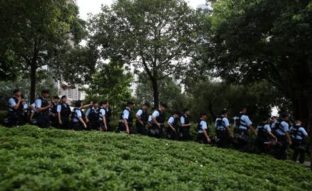 Police patrol following a day of violence in Hong Kong