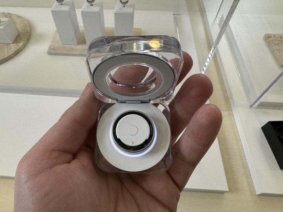 The Galaxy Ring charger features a circular LED battery indicator. (Image: Howley)