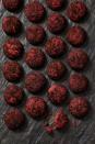 <p>Can't decide if the fam deserves coal this year? Sprinkle a little dark black cocoa powder onto red velvet crinkles to give them a hint.</p><p>Get the <a href="https://www.goodhousekeeping.com/food-recipes/a28509374/black-and-red-crinkle-cookies-recipe/" rel="nofollow noopener" target="_blank" data-ylk="slk:Black and Red Crinkle Cookies recipe;elm:context_link;itc:0;sec:content-canvas" class="link "><strong>Black and Red Crinkle Cookies recipe</strong></a>.</p>