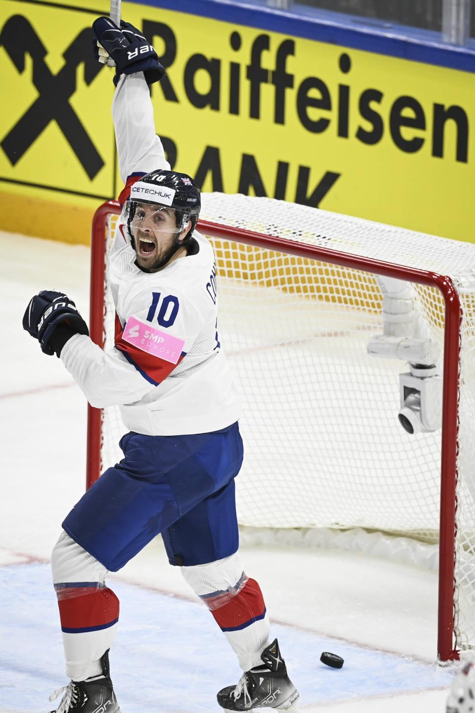 Scott Conway of Great Britain celebrates 3-3 goal during the 2022 IIHF Ice Hockey World Championships preliminary round group B match between Norway and Great Britain in Tampere, Finland, Sunday May 15, 2022. (Emmi Korhonen/Lehtikuva via AP)