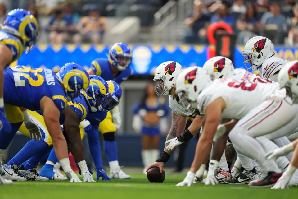 General view of the line of scrimmage as Arizona Cardinals guard Hjalte Froholdt (72) prepares to snap the football against the Los Angeles Rams during the first quarter at SoFi Stadium in Inglewood on Oct. 15, 2023.