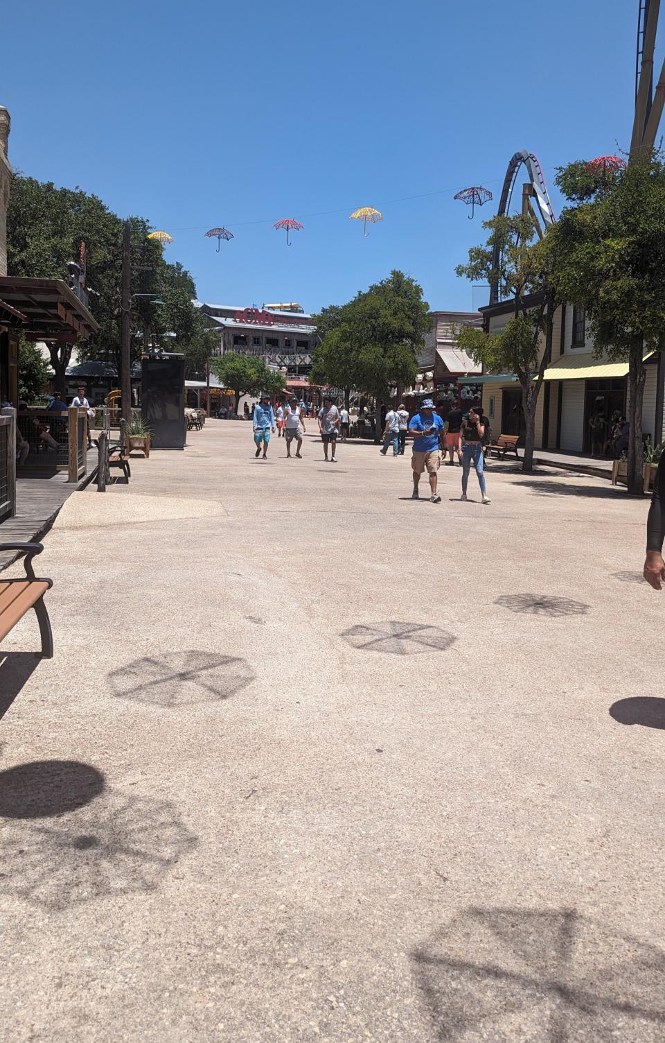 A main throughway at Six Flags Fiesta Texas is largely empty on Thursday, July 20. While the heat was intense, lines were short and it was easy to breeze on and off of rides.