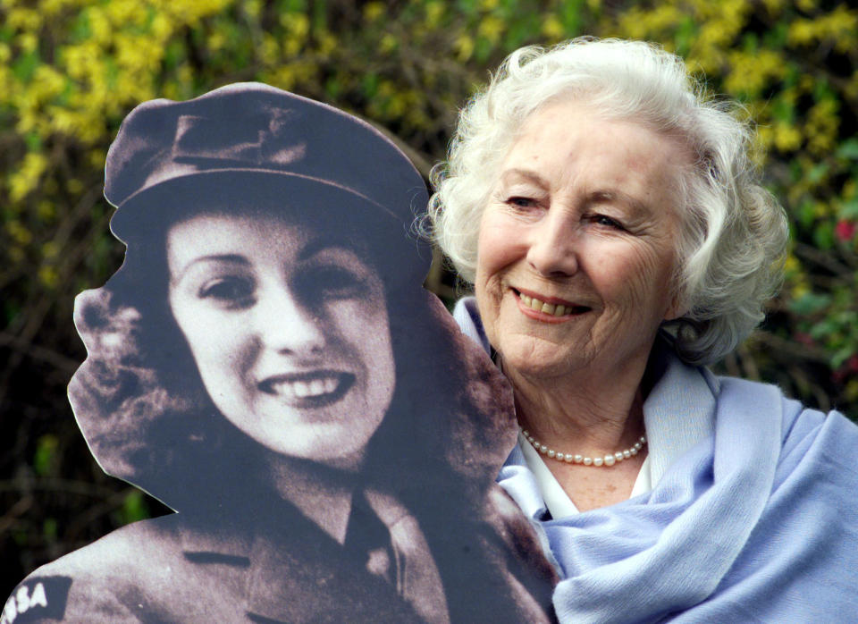 File photo dated 23/03/20 of Dame Vera Lynn in the garden of the Savoy Hotel, after she was named personality of the century in a nationwide poll. Queen Elizabeth II gave a televised message to the nation during the coronavirus outbreak.