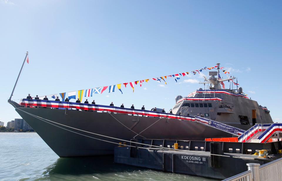 The USS Detroit decorated with for her commissioning in front of the Renaissance Center in Detroit, Michigan on October 22, 2016.