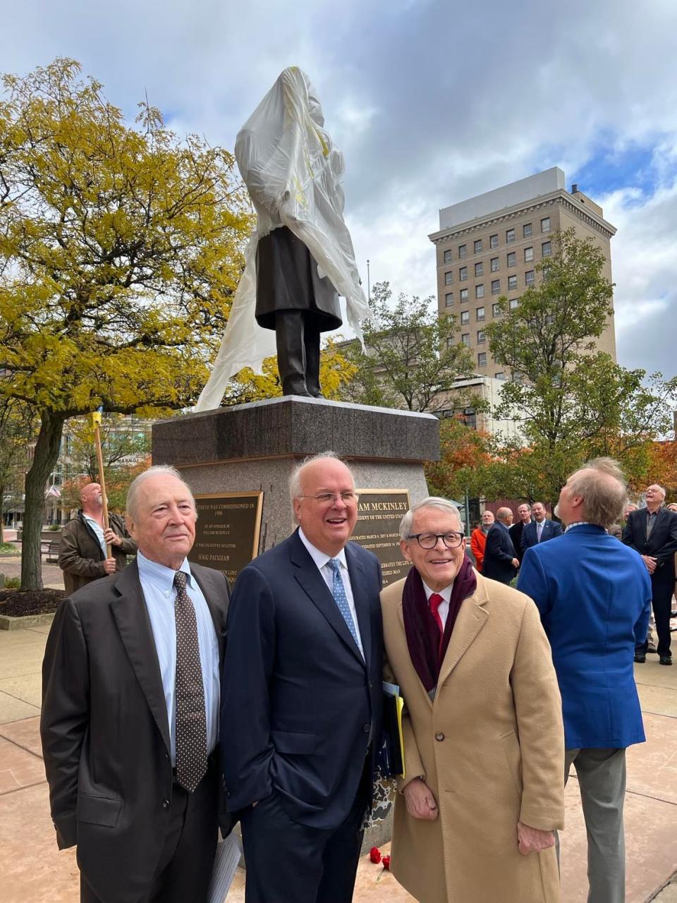 From left, W. R. Timken Jr., Karl Rove and Gov. Mike DeWine are shown at the Saturday unveiling of a President William McKinley statue in downtown Canton.