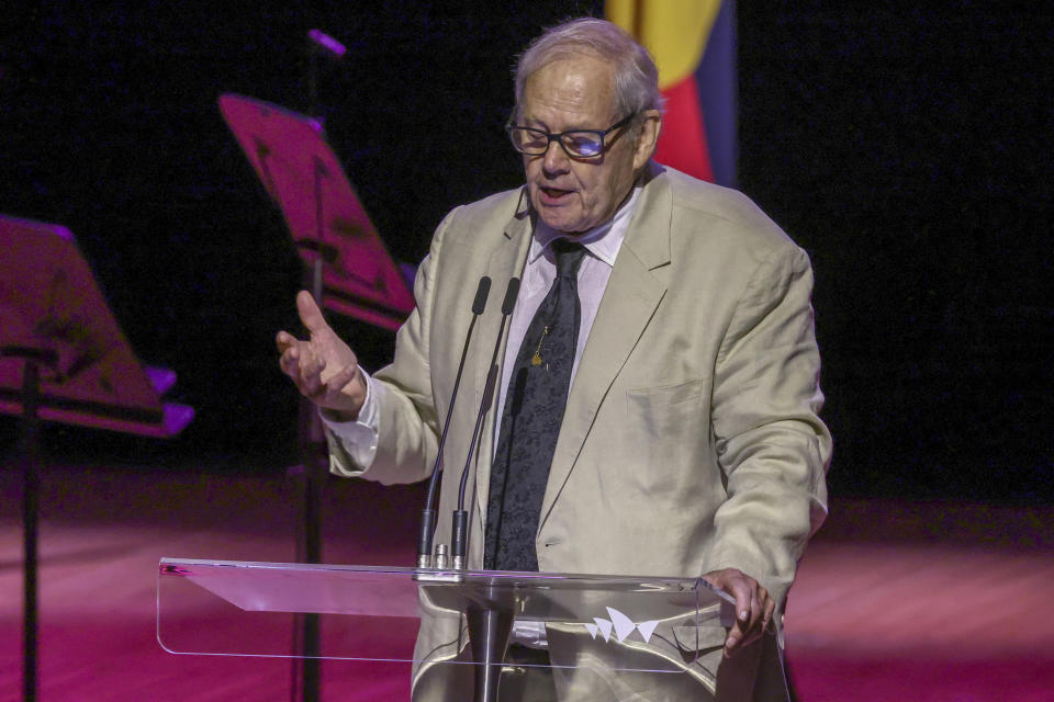 Australian movie director Bruce Beresford speaks during the State Memorial Service for Australian comedian and actor Barry Humphries at the Sydney Opera House in Sydney, Friday, Dec. 15, 2023. King Charles III has paid tribute to the late Barry Humphries at a state memorial service with a message that recalled the monarch's own apprehension when the comedian's alter ego Dame Edna Everage played a prank on him in a royal box a decade ago. (David Gray/Pool Photo via AP)