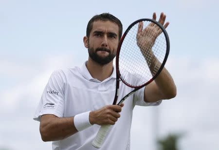 Britain Tennis - Wimbledon - All England Lawn Tennis & Croquet Club, Wimbledon, England - 2/7/16 Croatia's Marin Cilic celebrates winning his match against Slovakia's Lukas Lacko REUTERS/Andrew Couldridge