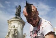 <p>People in costume take part in a walk for World Zombie Day 2017 on Place de la République in Paris, France, Oct. 7, 2017. (Photo: EFE/EPA/IAN LANGSDON) </p>