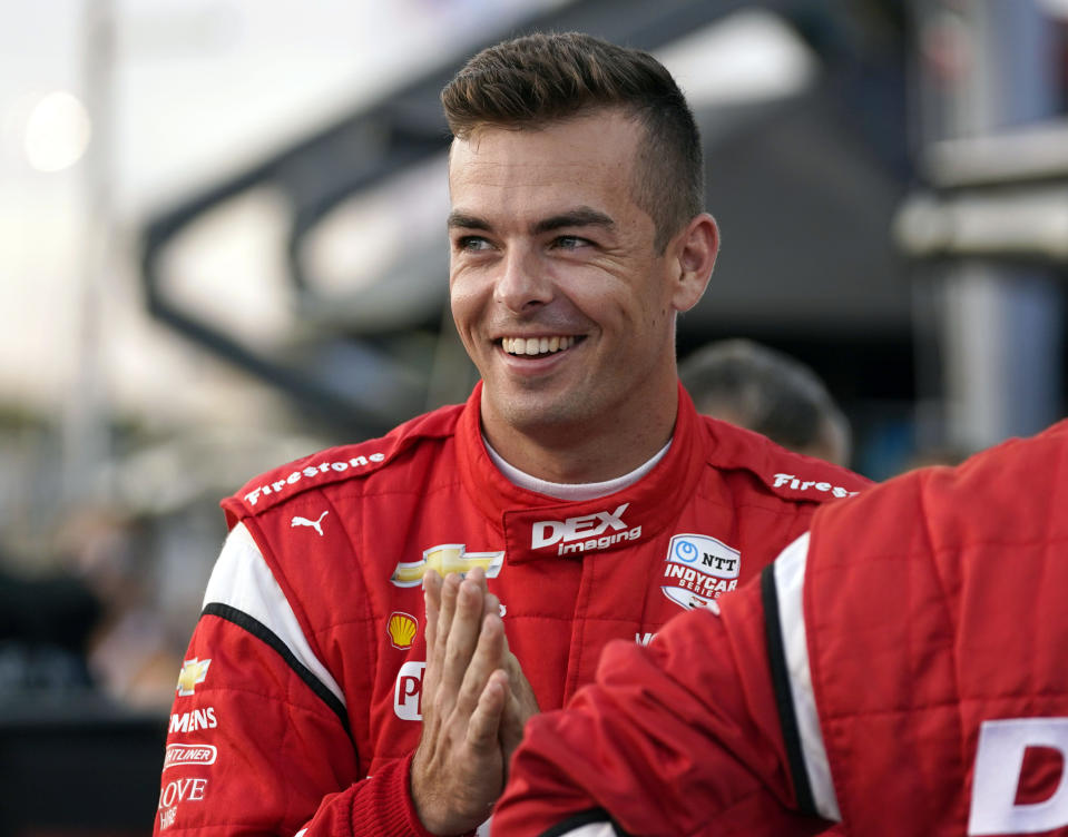 FILE - Scott McLaughlin smiles before an IndyCar auto race at World Wide Technology Raceway, Aug. 21, 2021, in Madison, Ill. The IndyCar season begins Sunday, March 5, 2023, with the Grand Prix of St. Petersburg. (AP Photo/Jeff Roberson, File)