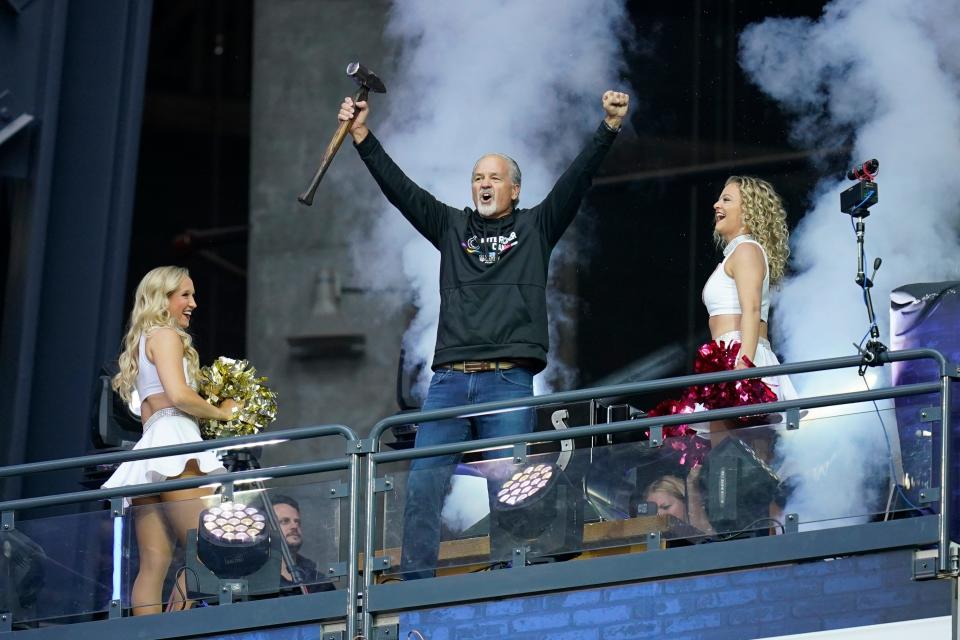 Former Indianapolis Colts head coach Chuck Pagano waves before an NFL football game between the Indianapolis Colts and the Jacksonville Jaguars, Sunday, Oct. 16, 2022, in Indianapolis.(AP Photo/Michael Conroy)