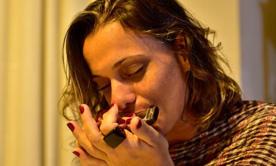 Woman playing a harmonica