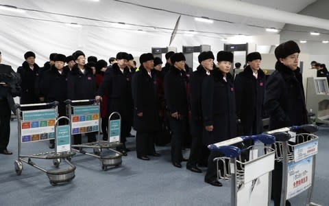  North Korean delegation of 32 people, including 10 athletes of North Korean Olympic team, arrive at the Gangneung Olympic Village  - Credit: Jeon Heon-Kyun-Pool/Getty Images