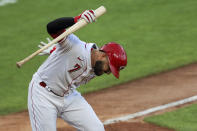 Cincinnati Reds' Eugenio Suarez reacts as he flies out to end a baseball game in the ninth inning against the Detroit Tigers at Great American Ballpark in Cincinnati, Saturday, July 25, 2020. (AP Photo/Aaron Doster)