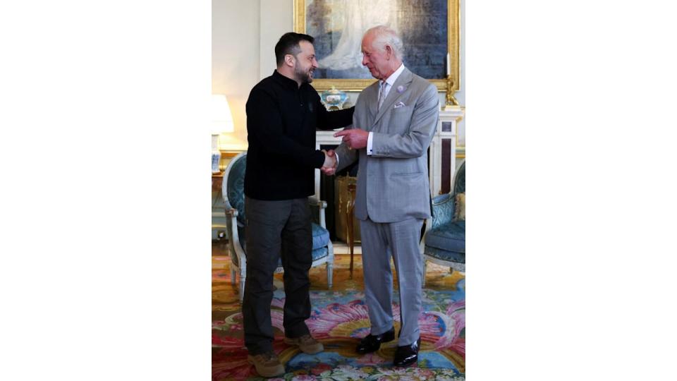 Volodymyr Zelenskyy shaking King Charles' hand