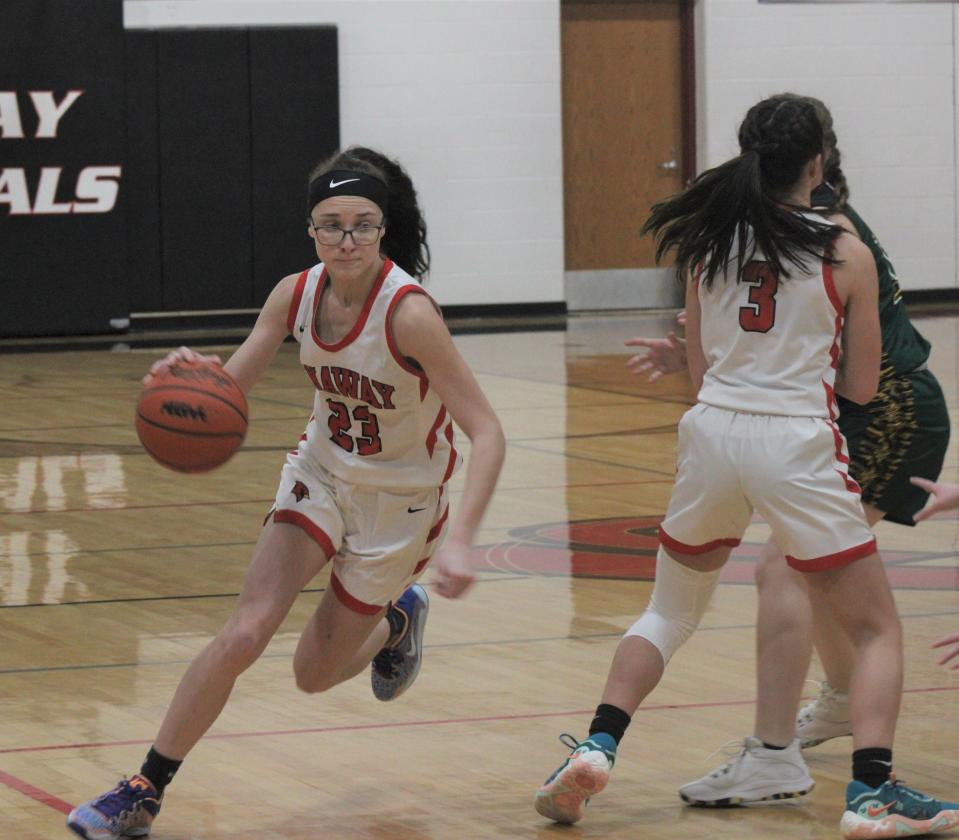Image: Onaway Girls 1
Onaway senior guard Madilyn Crull (left) drives to the basket during the third quarter of a girls basketball contest against Forest Area at home on Friday. Setting a pick for Crull is sophomore teammate Charlotte Box (3).