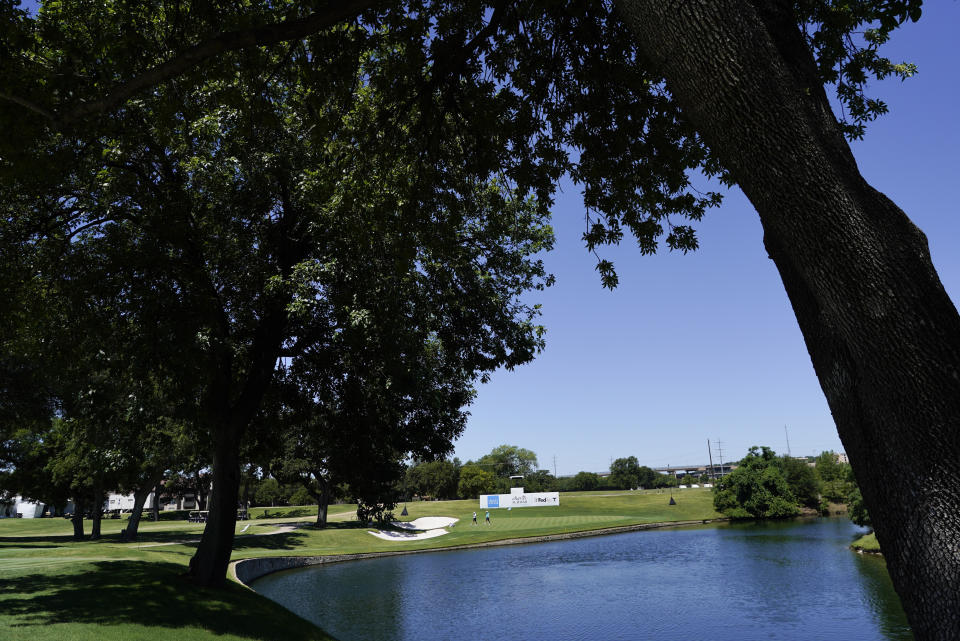 Dustin Johnson walks off the 13th green during practice for the Charles Schwab Challenge golf tournament at the Colonial Country Club in Fort Worth, Texas, Wednesday, June 10, 2020. (AP Photo/David J. Phillip)