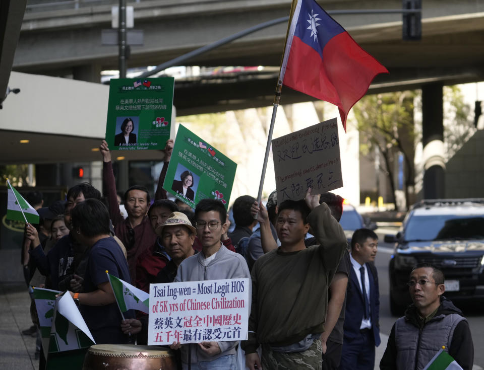 Supporters of Taiwan's President Tsai Ing-wen await her arrival outside The Westin Bonaventure Hotel in Los Angeles Tuesday, April 4, 2023. (AP Photo/Damian Dovarganes)