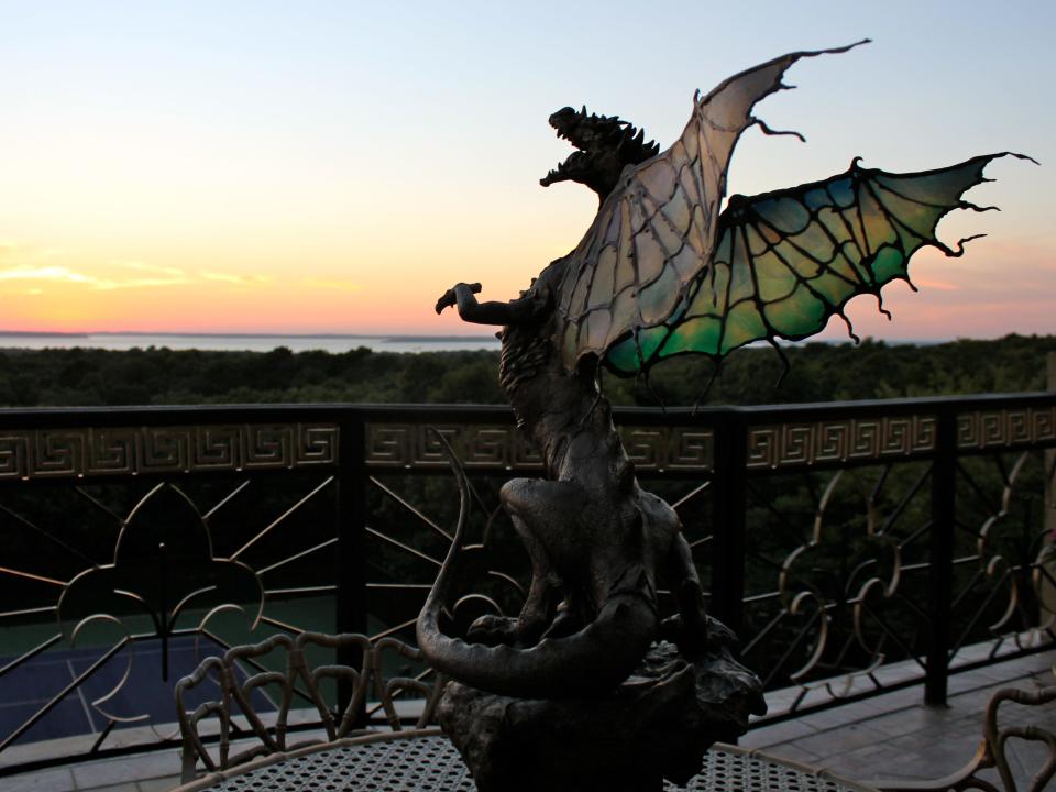 A dragon sculpture on the balcony