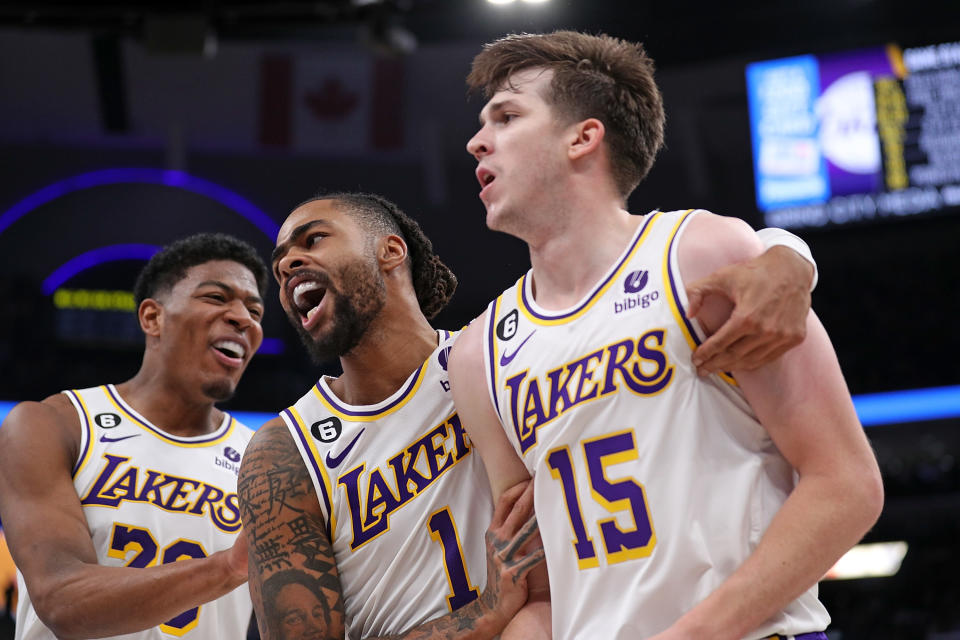 MEMPHIS, TENNESSEE - APRIL 16: D'Angelo Russell #1 of the Los Angeles Lakers, Rui Hachimura #28 of the Los Angeles Lakers and Austin Reaves #15 of the Los Angeles Lakers react during the second half against the Memphis Grizzlies during Game One of the Western Conference First Round Playoffs at FedExForum on April 16, 2023 in Memphis, Tennessee. NOTE TO USER: User expressly acknowledges and agrees that, by downloading and or using this photograph, User is consenting to the terms and conditions of the Getty Images License Agreement.  (Photo by Justin Ford/Getty Images)